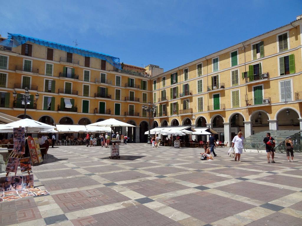 Placa Major in Palma Old Town, Mallorca, with cafe terraces under the arcades