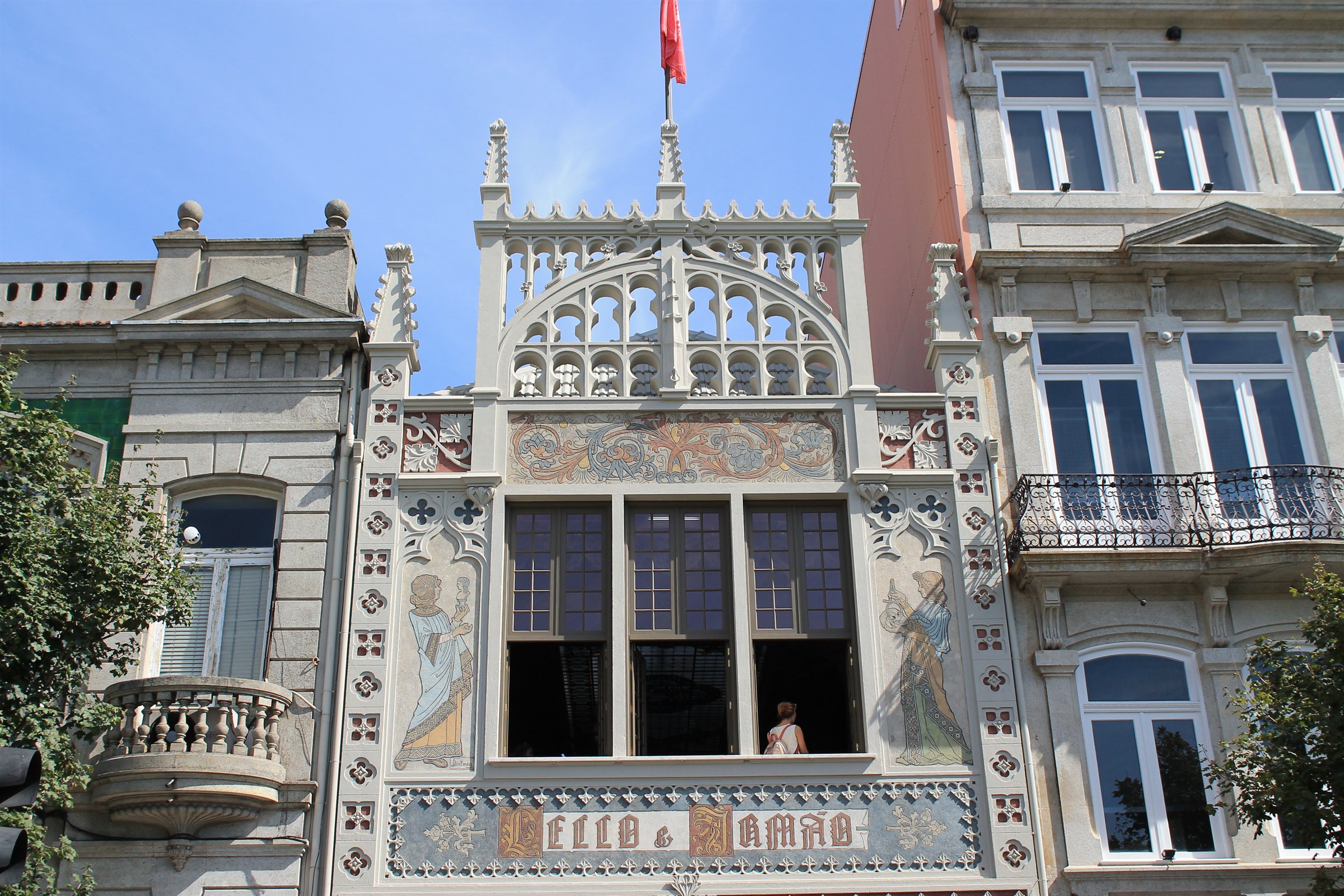 The neo-Gothic painted facade of Livraria Lello bookshop in Porto with its Lello e Irmao lettering